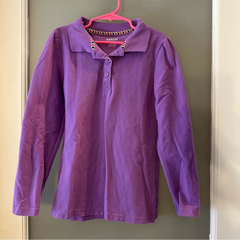 Bienzoe purple long sleeve polo shirt. Girls size 10/12